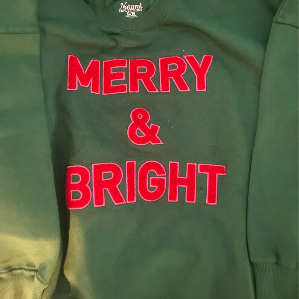 Green Sweatshirt with Red 'Merry & Bright' Text